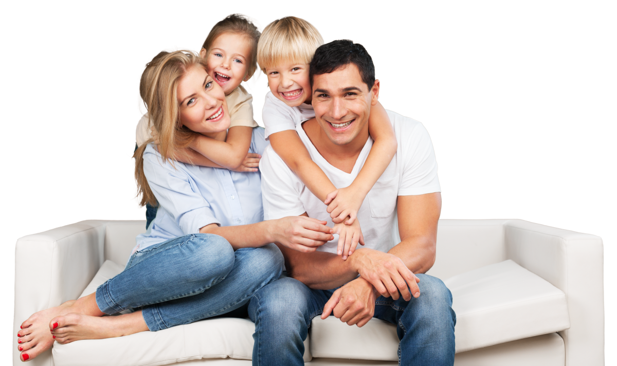 mother and father with two children sitting together on couch