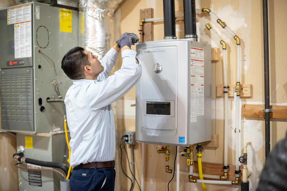 Person repairing water heater